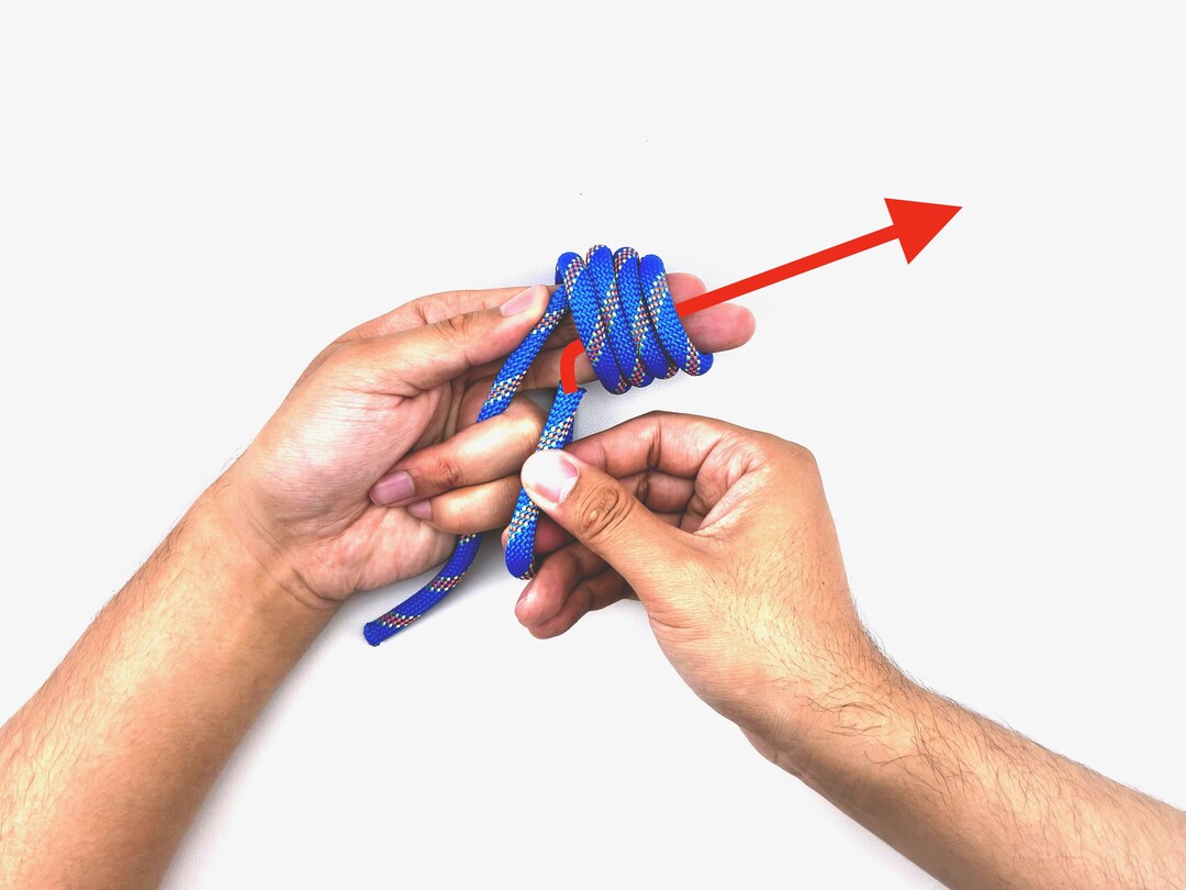Step 8 of tying the Multiple Overhand Knot knot - detailed visual instruction