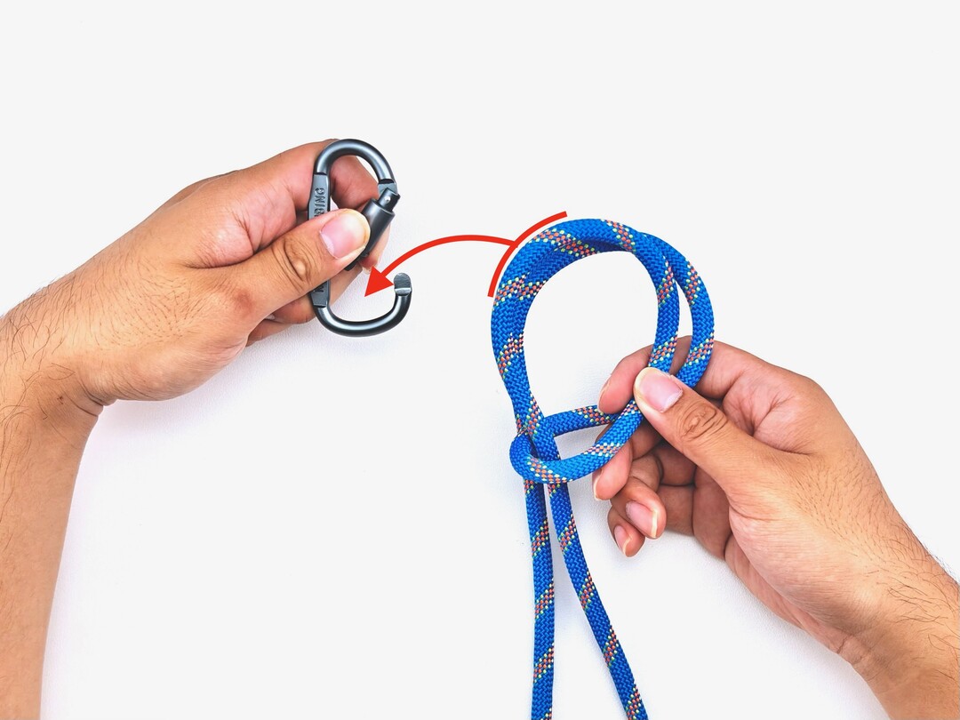 Step 2 of tying the Munter Hitch knot - detailed visual instruction