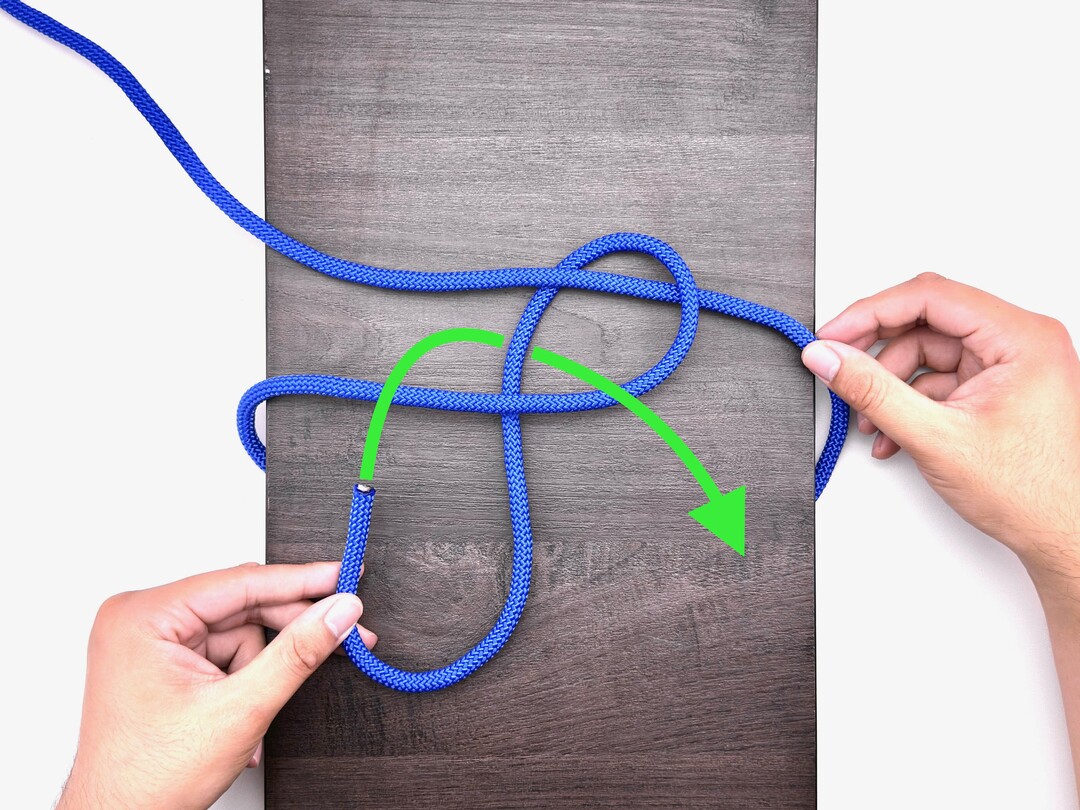Step 3 of tying the Packer's Knot knot - detailed visual instruction