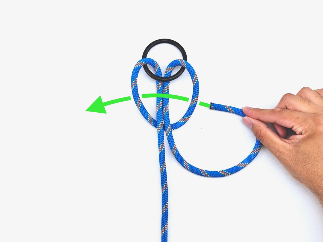 Step 5 of tying the Pedigree Cow Hitch knot - detailed visual instruction