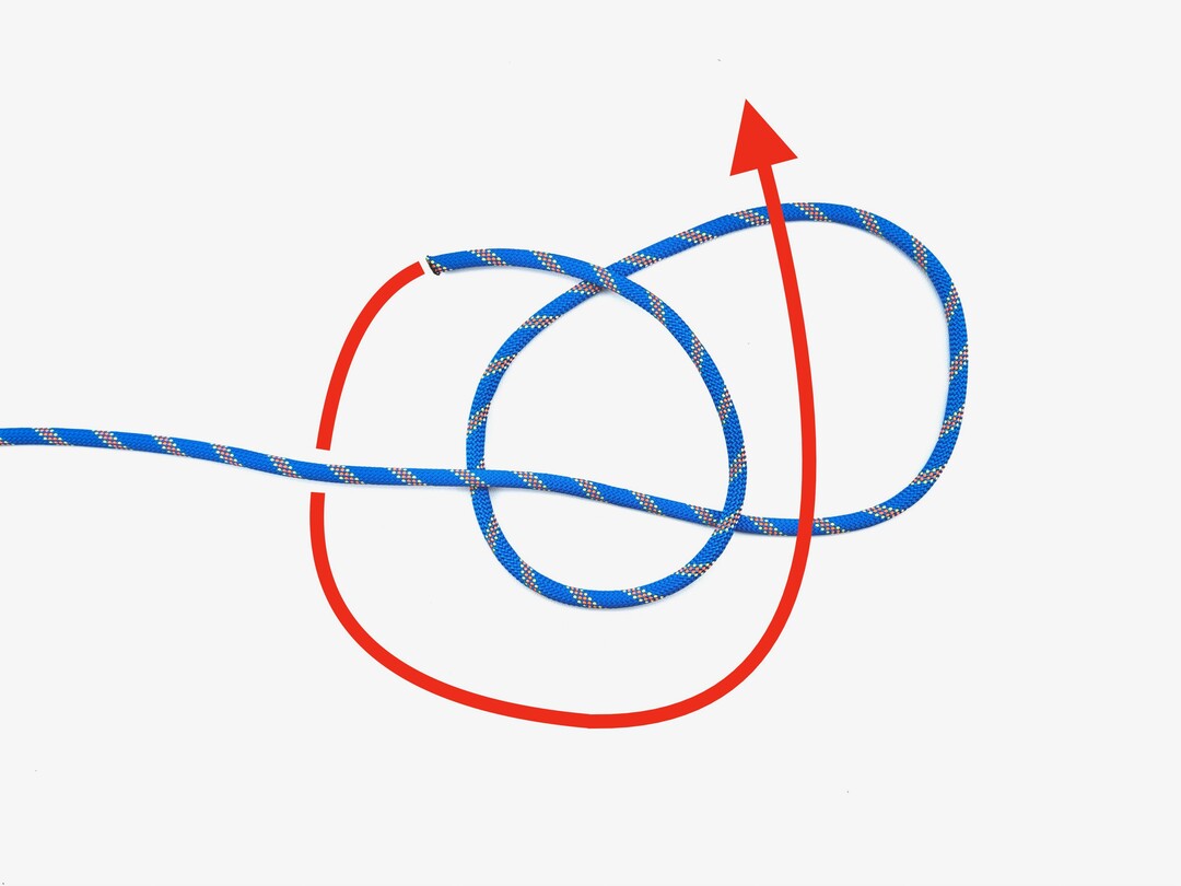 Step 2 of tying the Perfection Loop knot - detailed visual instruction