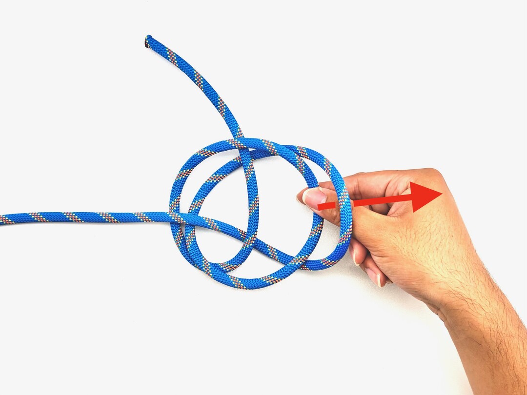 Step 4 of tying the Perfection Loop knot - detailed visual instruction