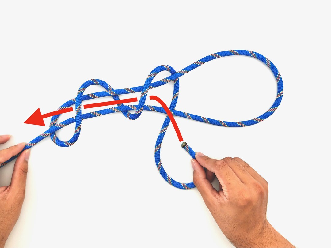 Step 5 of tying the Poacher's Knot knot - detailed visual instruction