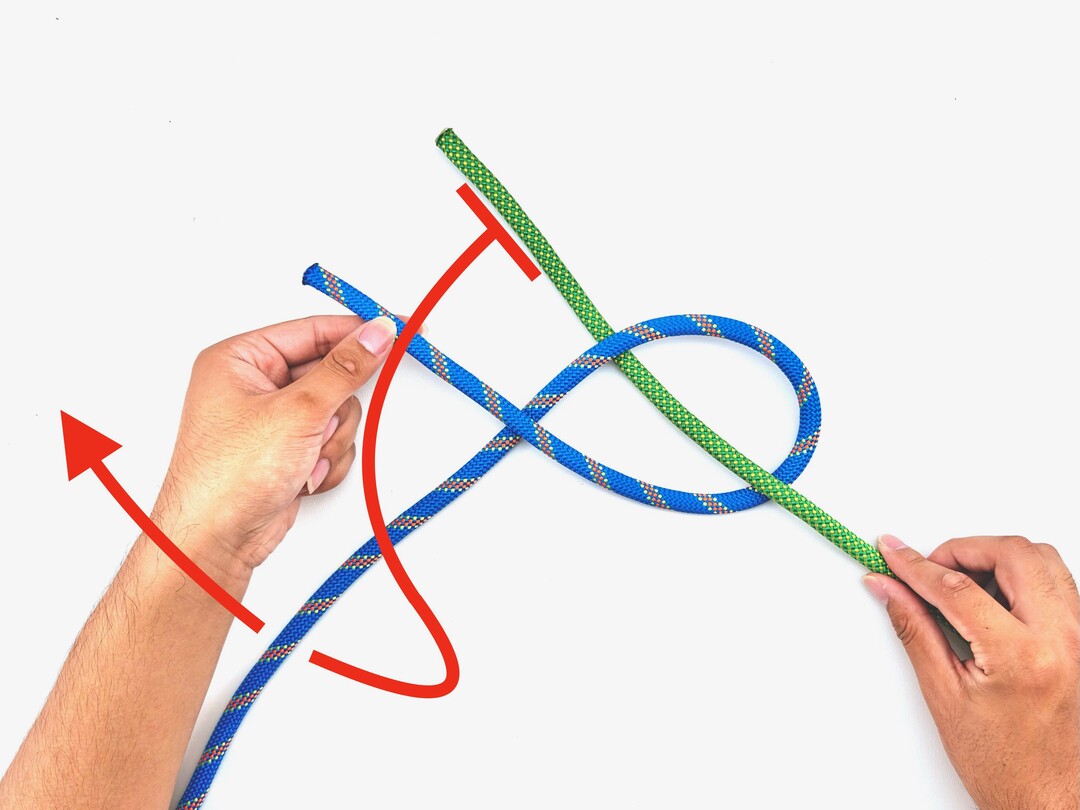 Step 3 of tying the Reever Knot knot - detailed visual instruction