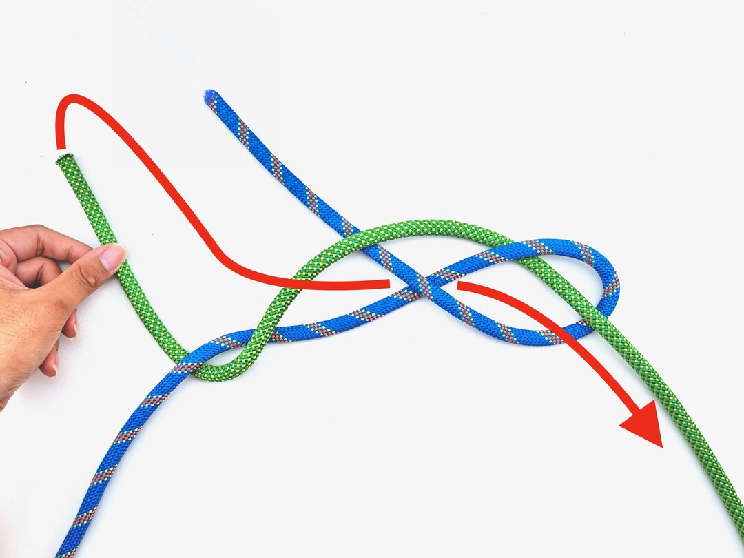 Step 4 of tying the Reever Knot knot - detailed visual instruction