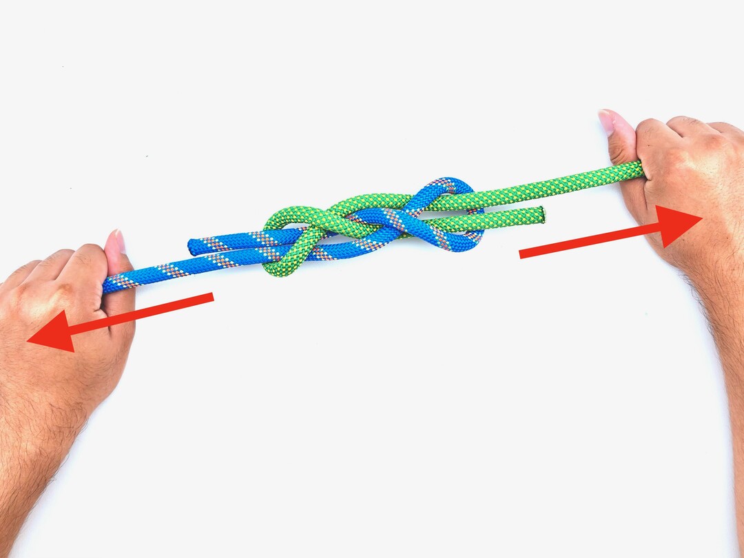 Step 6 of tying the Reever Knot knot - detailed visual instruction
