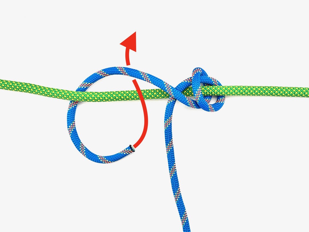 Step 3 of tying the Rolling Hitch knot - detailed visual instruction