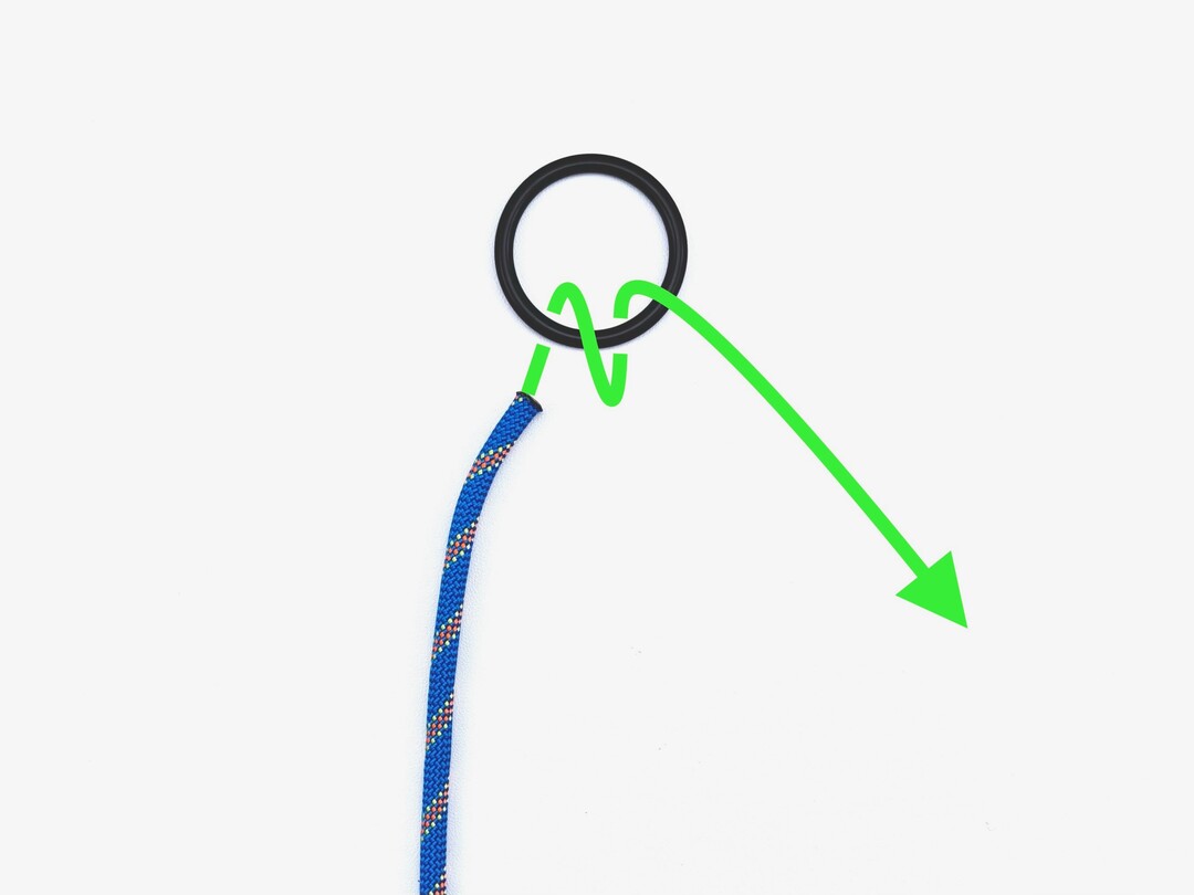 Step 1 of tying the Round Turn & Two Half Hitches knot - detailed visual instruction