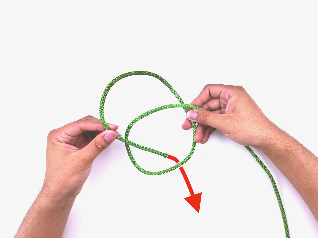 Step 3 of tying the Sailor's Cross knot - detailed visual instruction