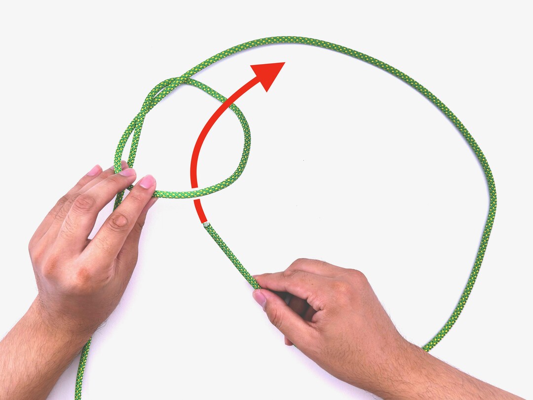 Step 5 of tying the Sailor's Cross knot - detailed visual instruction