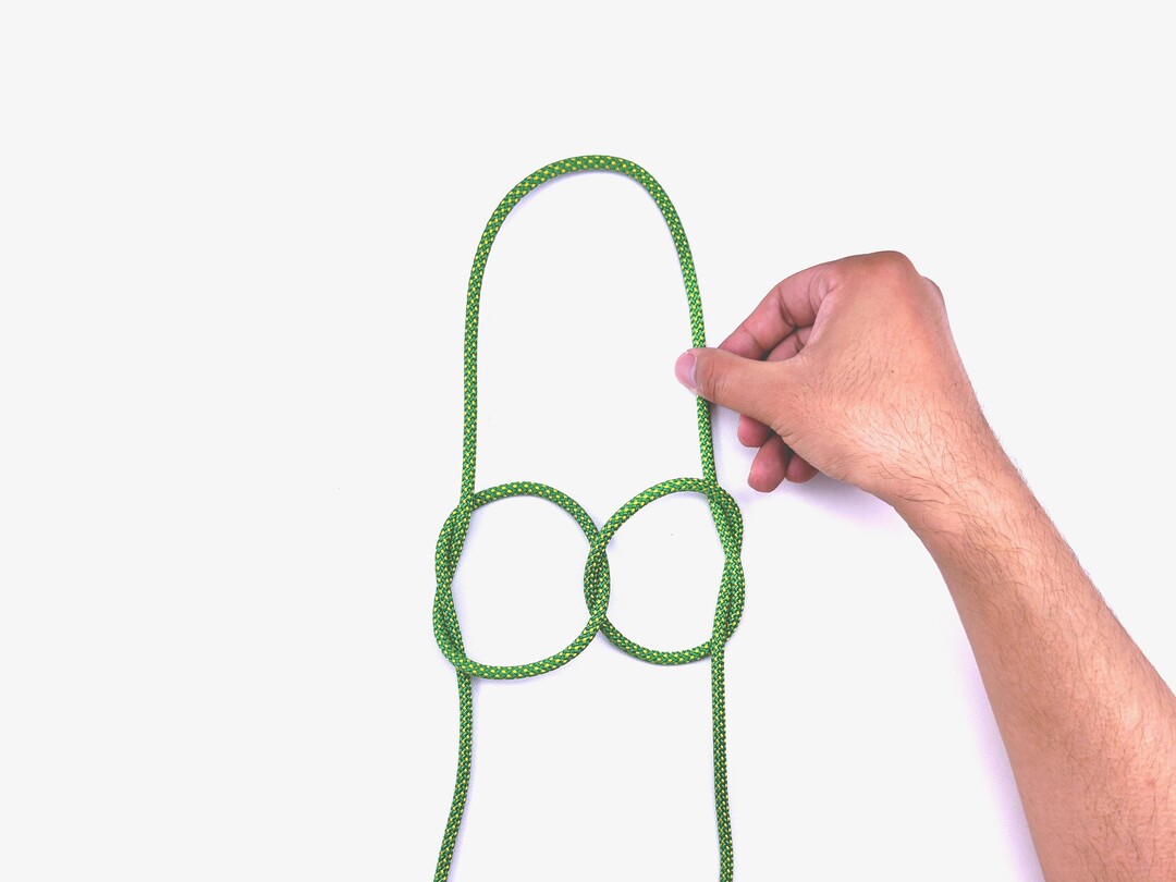 Step 9 of tying the Sailor's Cross knot - detailed visual instruction
