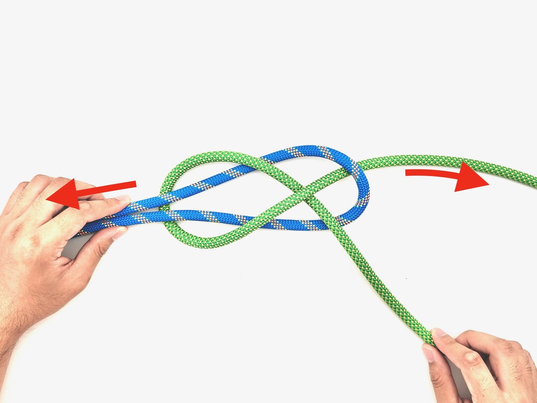 Step 5 of tying the Sheet Bend knot - detailed visual instruction
