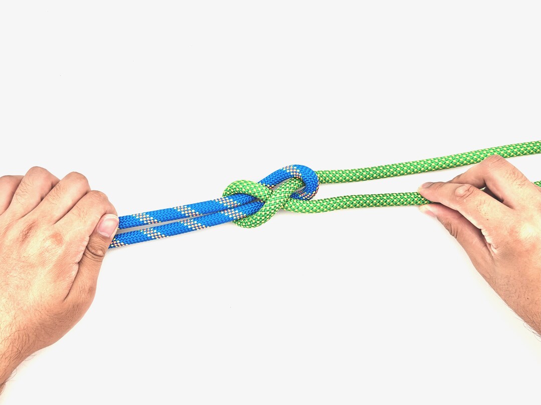 Step 6 of tying the Sheet Bend knot - detailed visual instruction