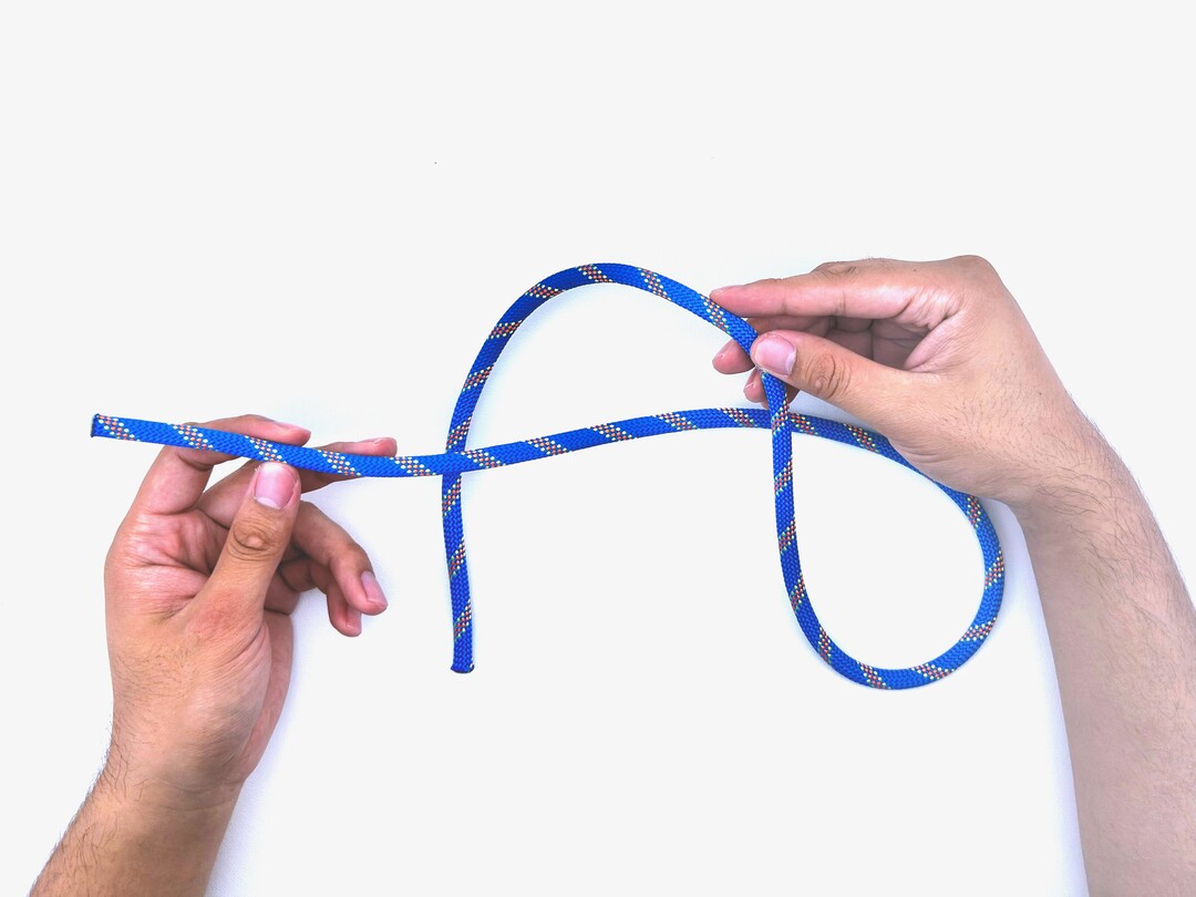 Step 3 of tying the Slipped Figure Eight knot - detailed visual instruction