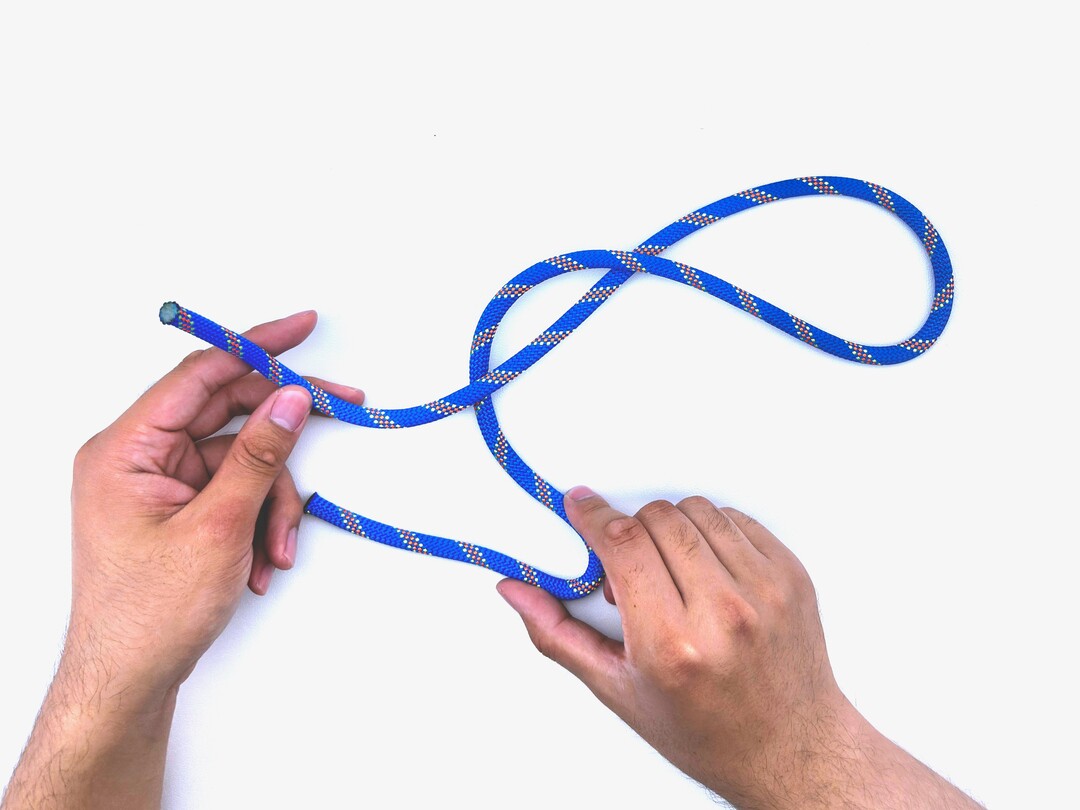 Step 4 of tying the Slipped Figure Eight knot - detailed visual instruction