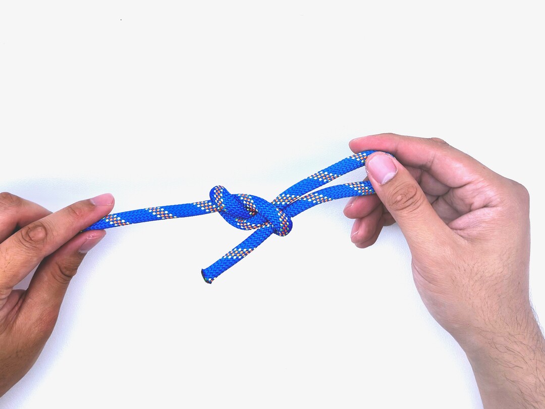 Step 7 of tying the Slipped Figure Eight knot - detailed visual instruction
