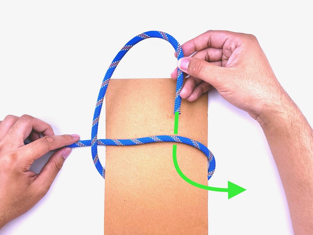Step 2 of tying the Slipped Square Knot knot - detailed visual instruction