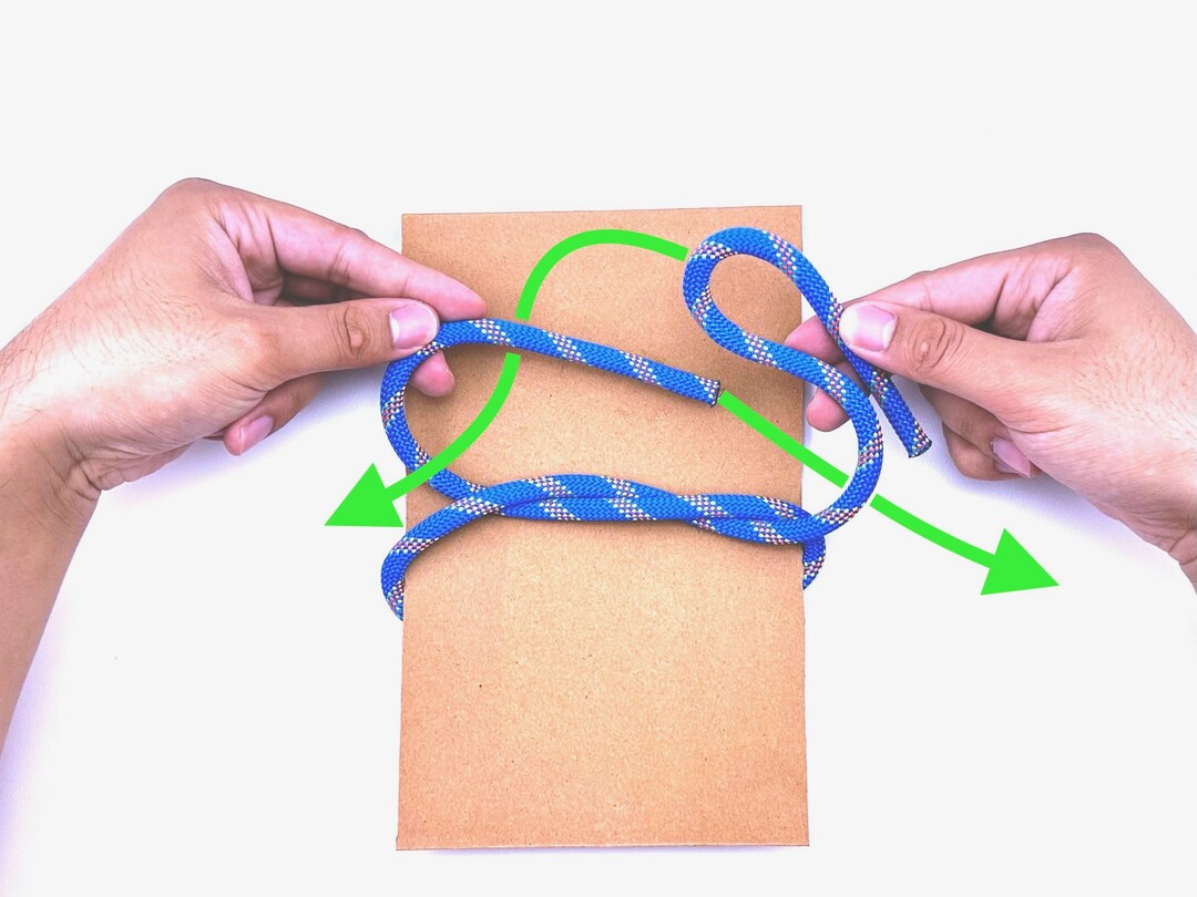 Step 3 of tying the Slipped Square Knot knot - detailed visual instruction
