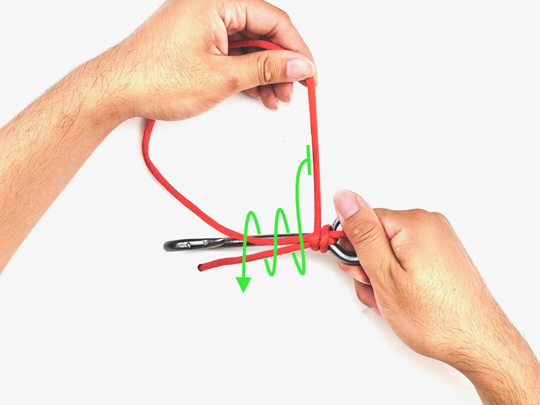 Step 6 of tying the Snelling a Hook knot - detailed visual instruction