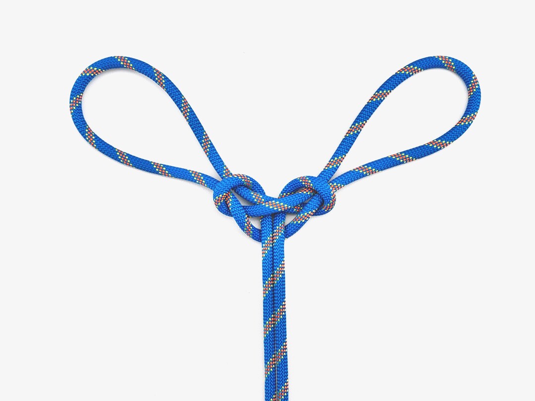 Step 12 of tying the Spanish Bowline knot - detailed visual instruction