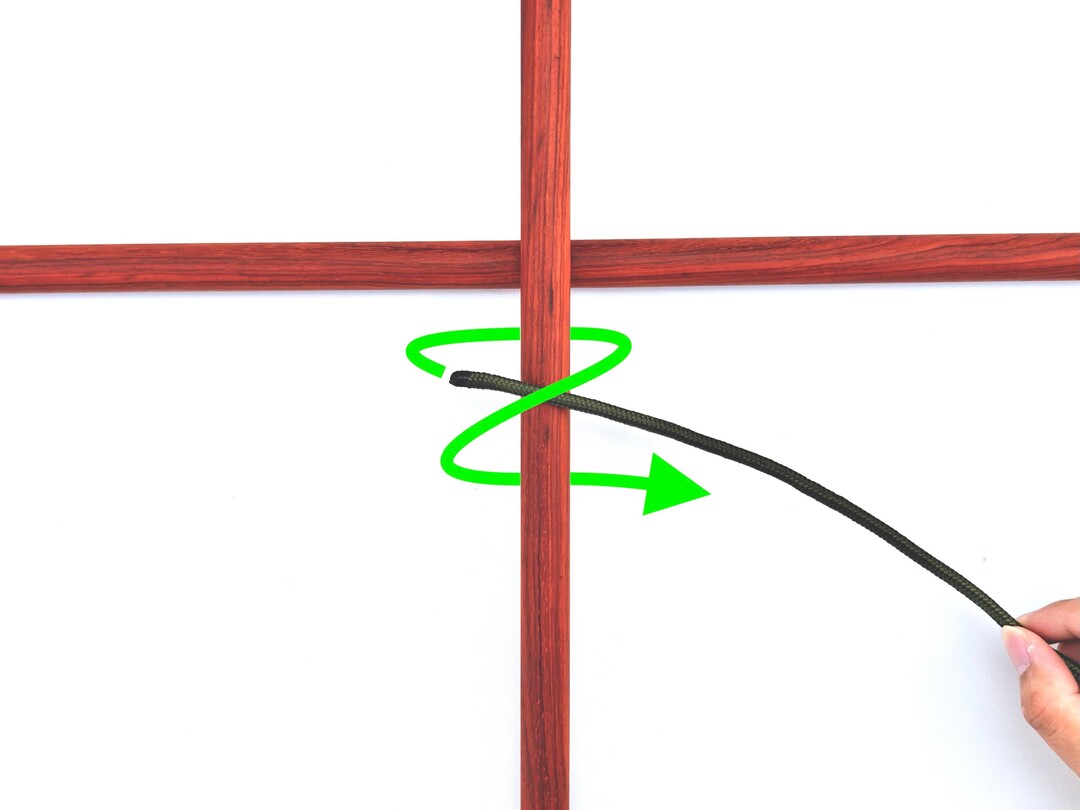 Step 1 of tying the Square Lashing knot - detailed visual instruction