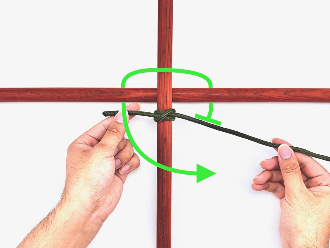 Step 3 of tying the Square Lashing knot - detailed visual instruction