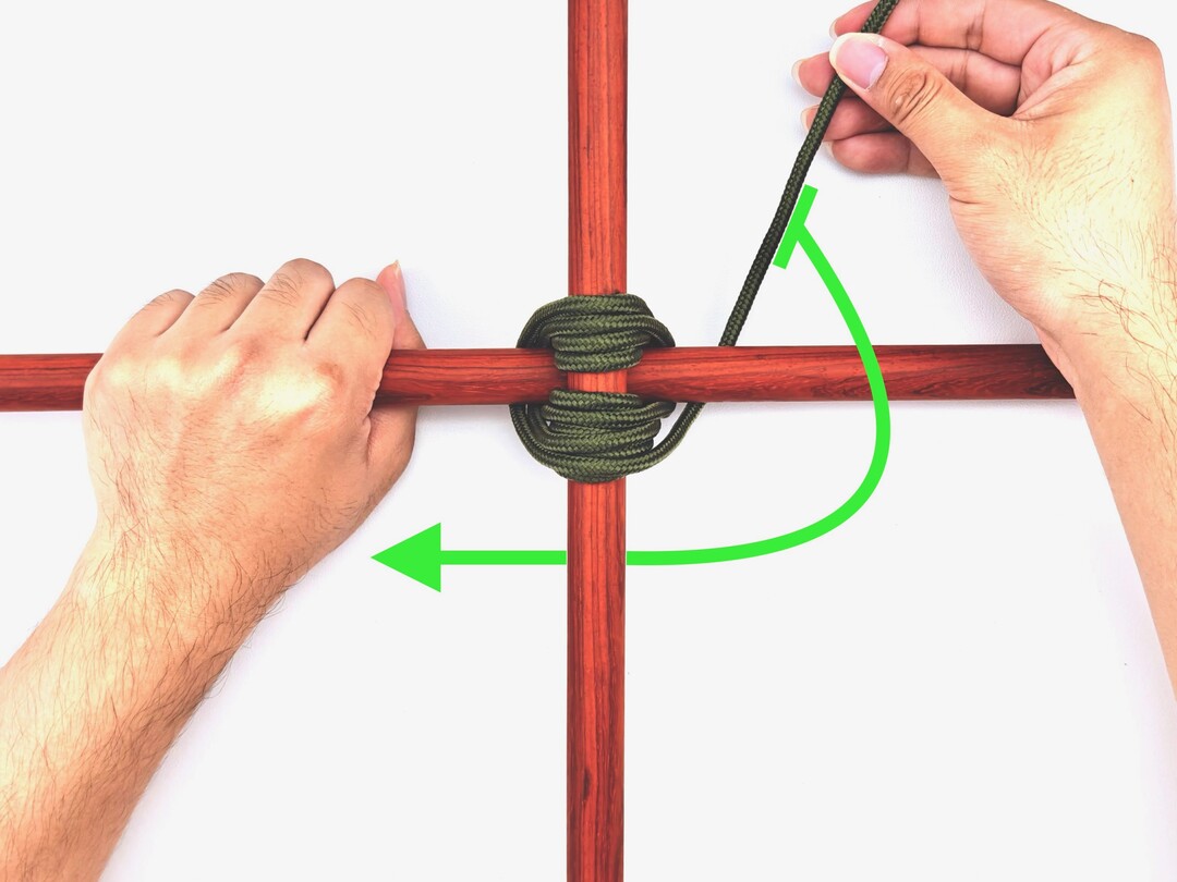 Step 6 of tying the Square Lashing knot - detailed visual instruction