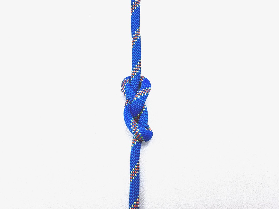 Step 2 of tying the Stevedore Knot knot - detailed visual instruction