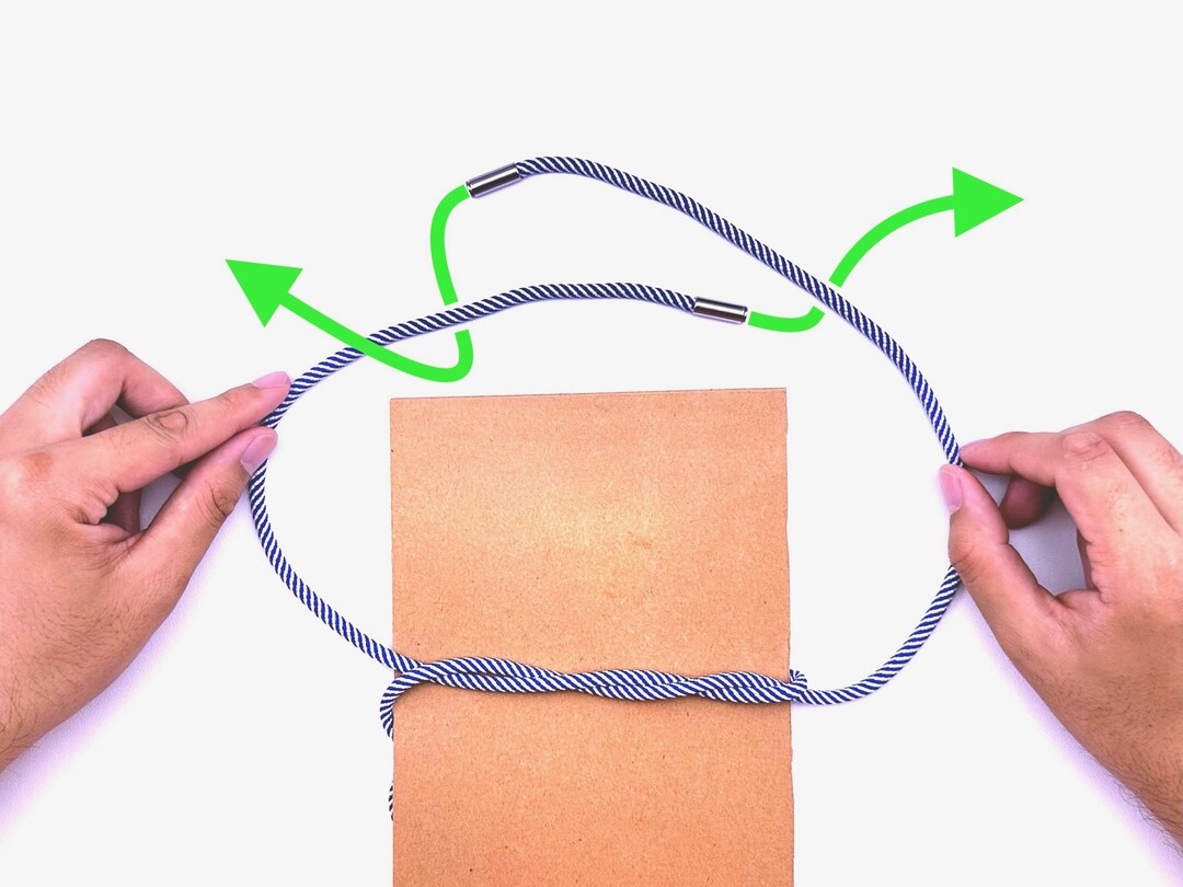 Step 5 of tying the Surgeon's Knot knot - detailed visual instruction