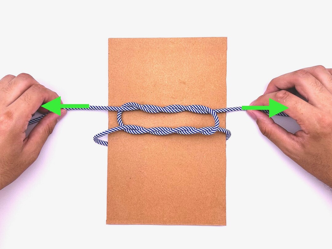 Step 6 of tying the Surgeon’s Knot with Second Tuck knot - detailed visual instruction