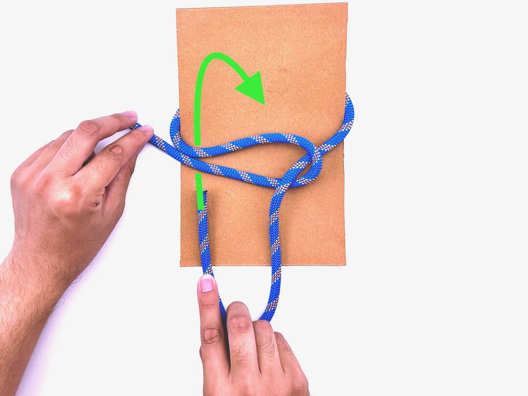 Step 3 of tying the Thief Knot knot - detailed visual instruction