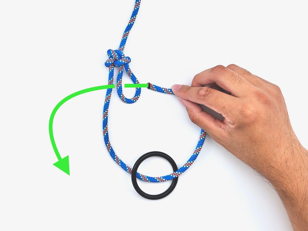 Step 4 of tying the Trucker's Hitch knot - detailed visual instruction