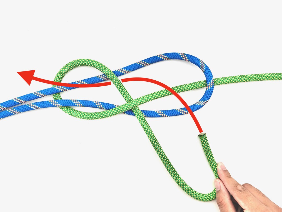 Step 5 of tying the Tucked Sheet Bend knot - detailed visual instruction