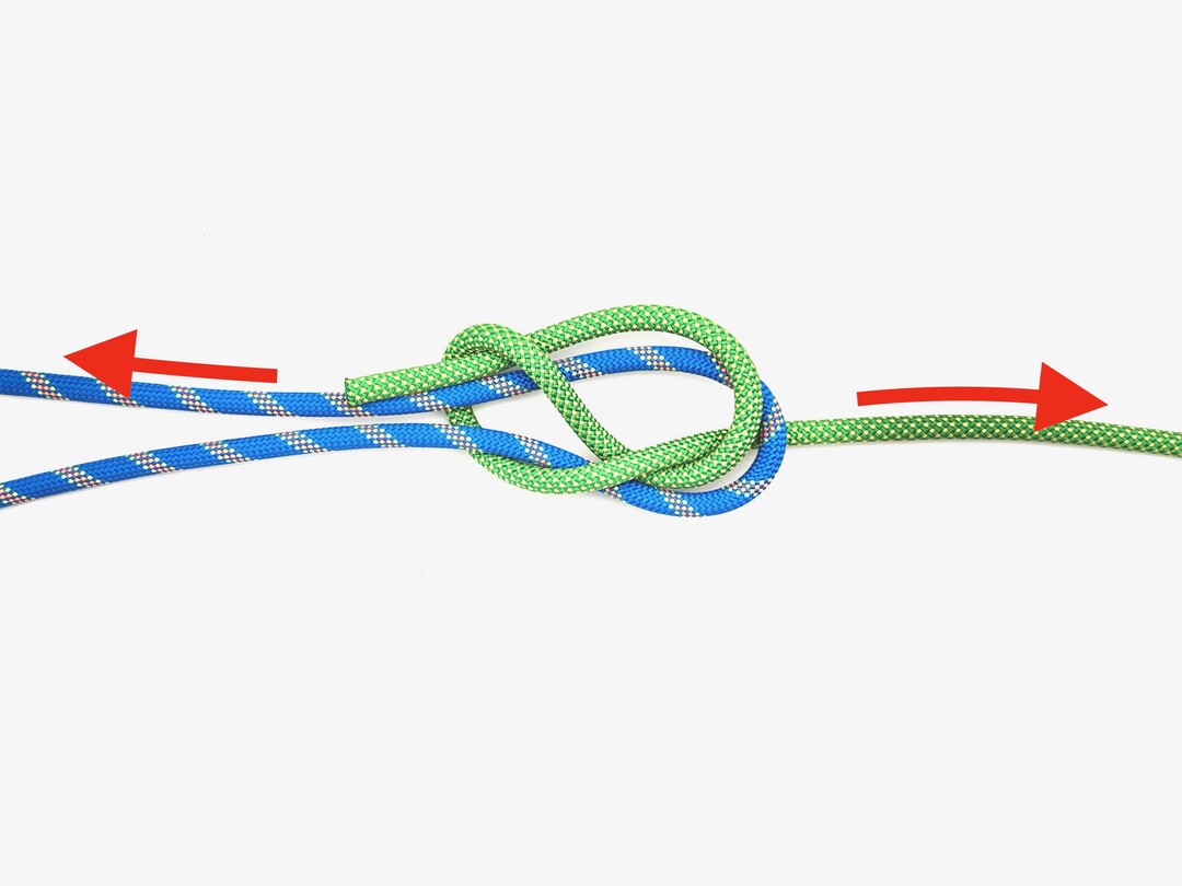 Step 6 of tying the Tucked Sheet Bend knot - detailed visual instruction