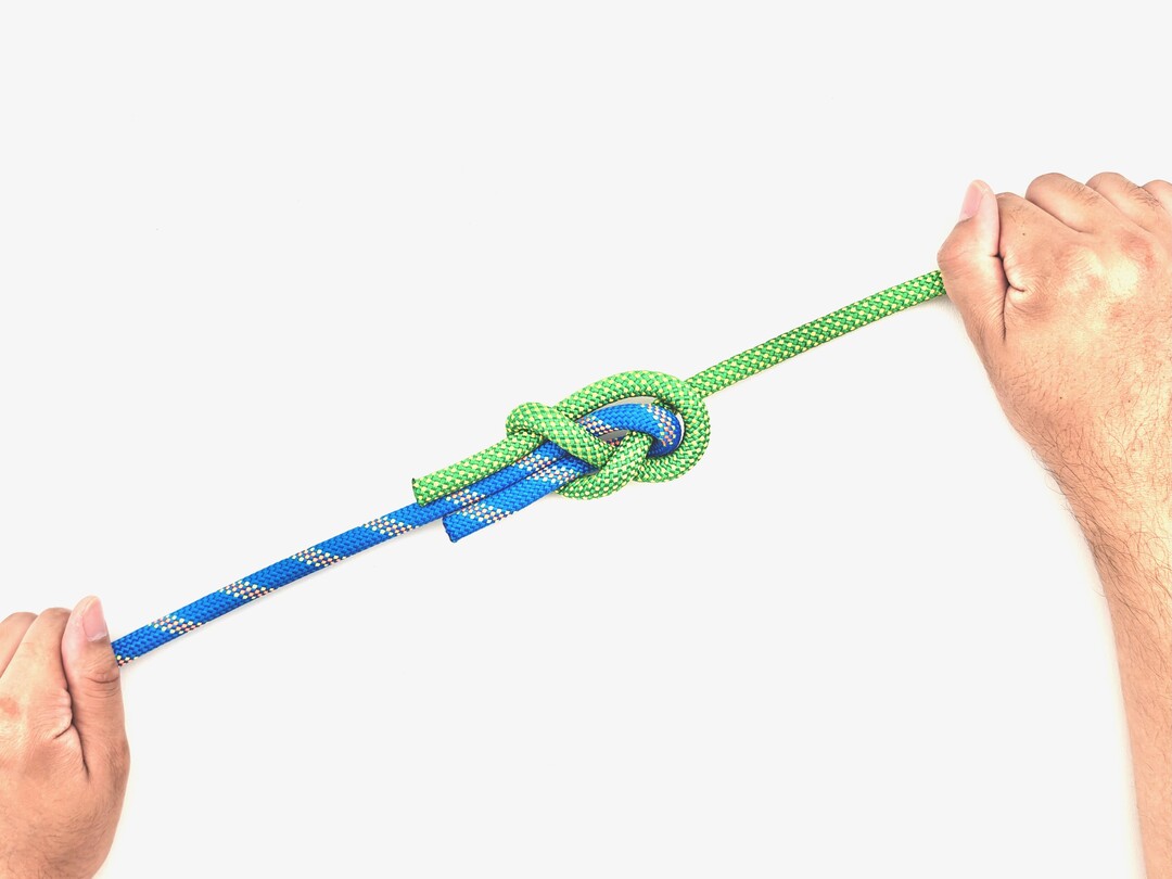 Step 7 of tying the Tucked Sheet Bend knot - detailed visual instruction
