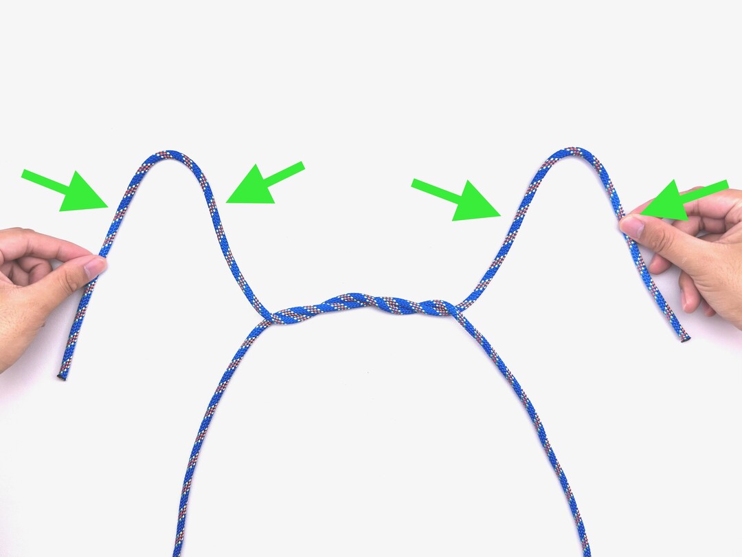Step 4 of tying the Turquoise Turtle Knot knot - detailed visual instruction