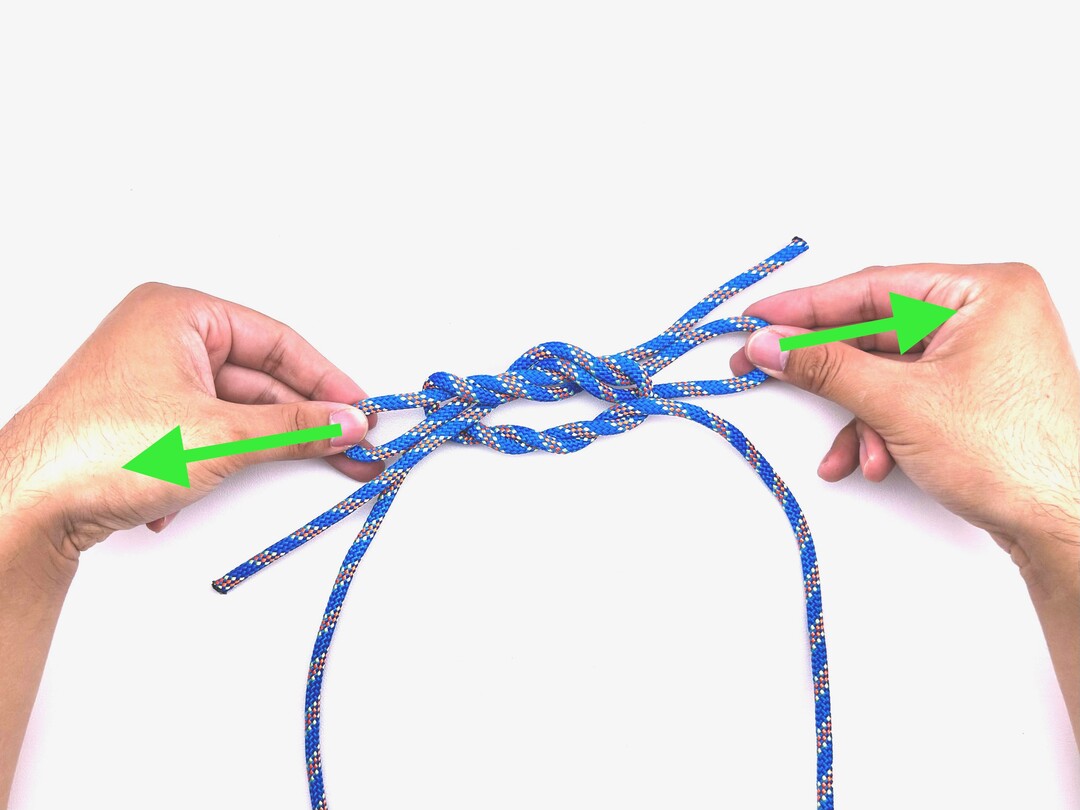 Step 7 of tying the Turquoise Turtle Knot knot - detailed visual instruction