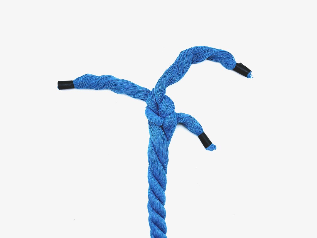 Step 1 of tying the Wall Knot knot - detailed visual instruction