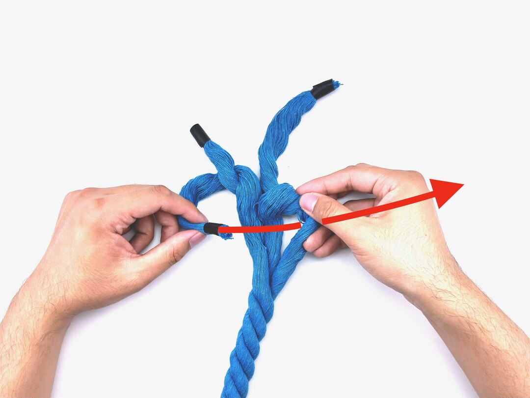 Step 6 of tying the Wall Knot knot - detailed visual instruction