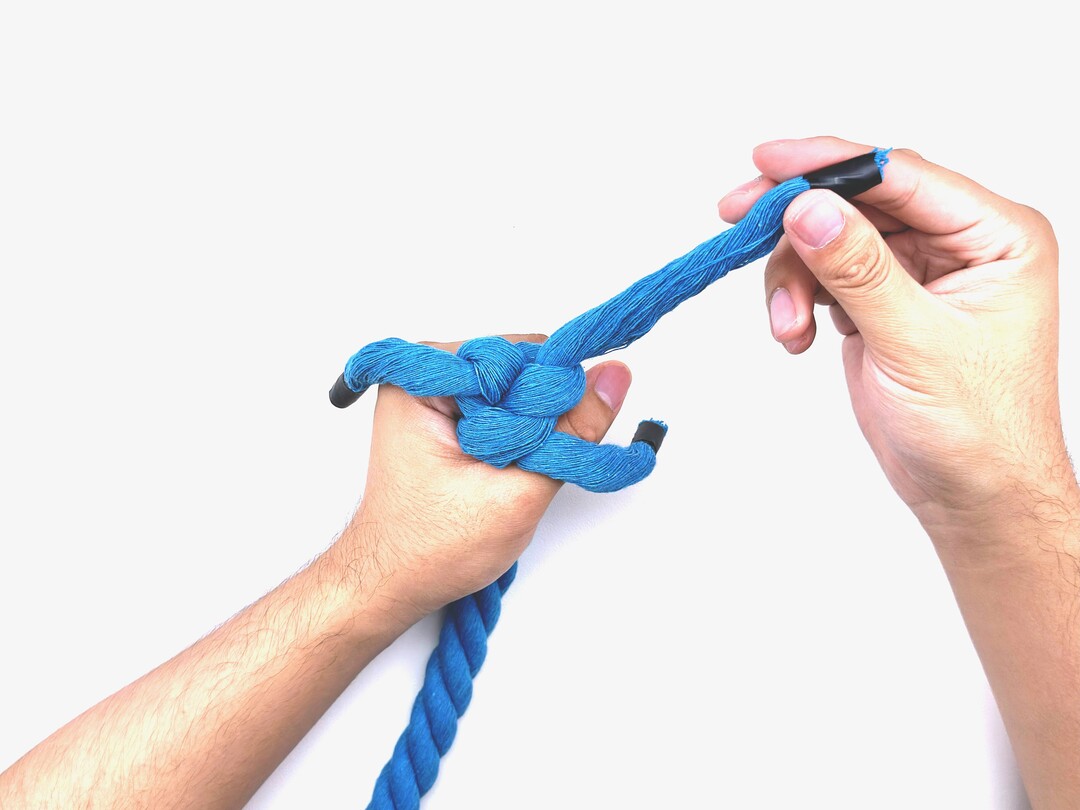 Step 9 of tying the Wall Knot knot - detailed visual instruction