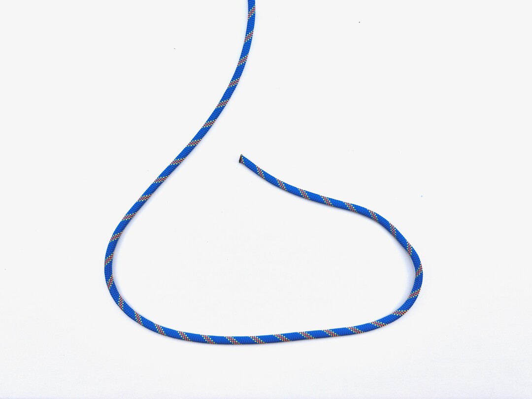 Step 1 of tying the Water Bowline knot - detailed visual instruction