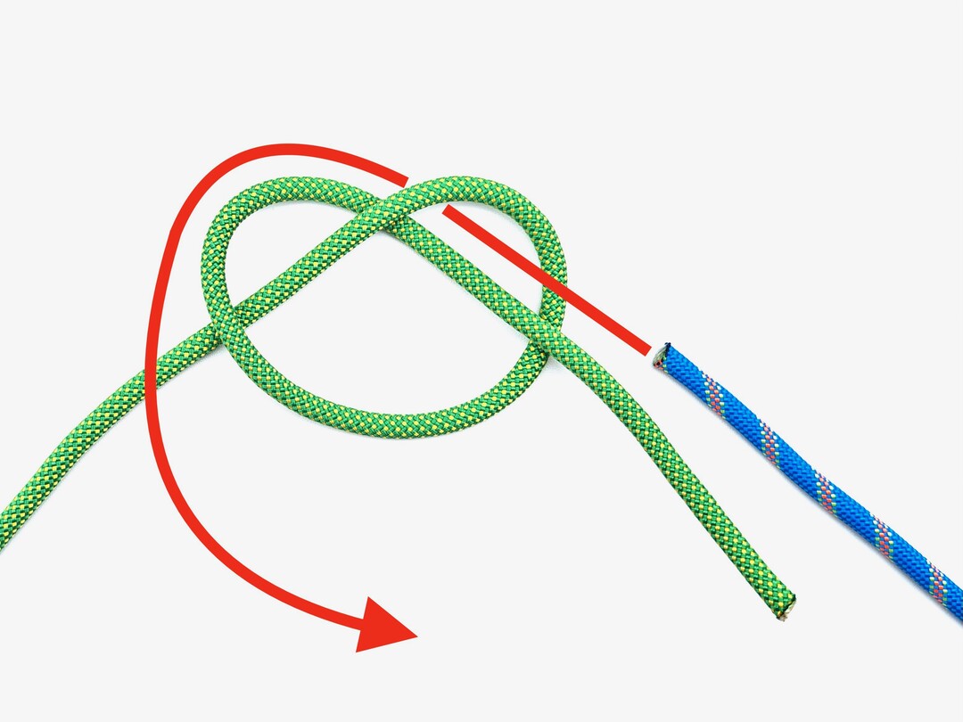 Step 3 of tying the Water Knot knot - detailed visual instruction