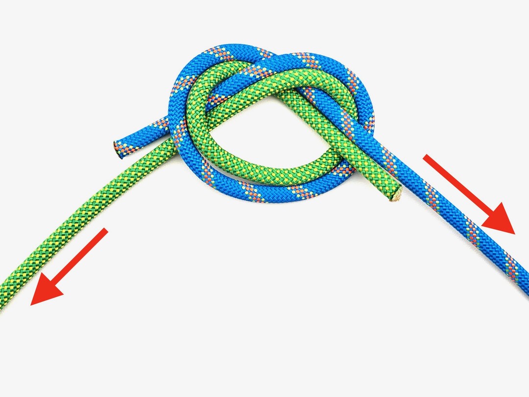 Step 5 of tying the Water Knot knot - detailed visual instruction